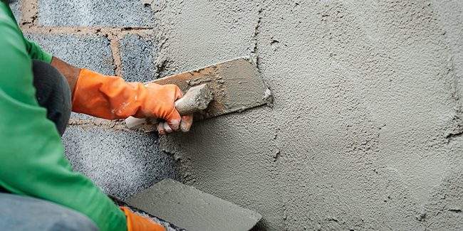 mur parpaing recouvrir enduit par build africa suarl